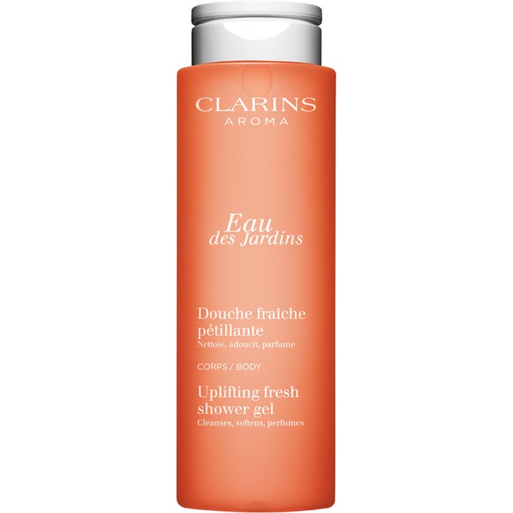 Clarins Aroma Eau des Jardins 200 ml virkistävä suihkugeeli mattapintaisessa oranssissa pullossa hopeisella korkilla