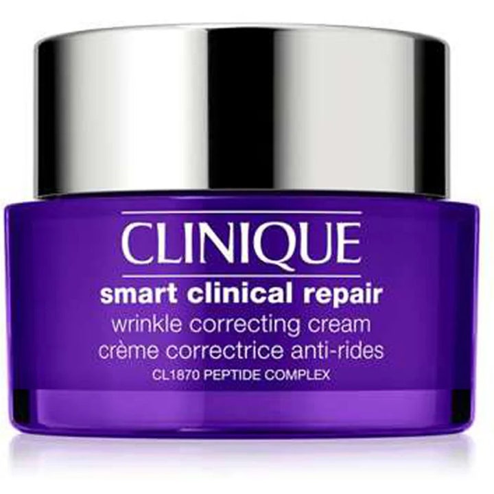 Clinique Smart Clinical Repair Wrinkle Correcting Cream ryppyjä silottava voide purppurassa purkissa hopeisella kannella.