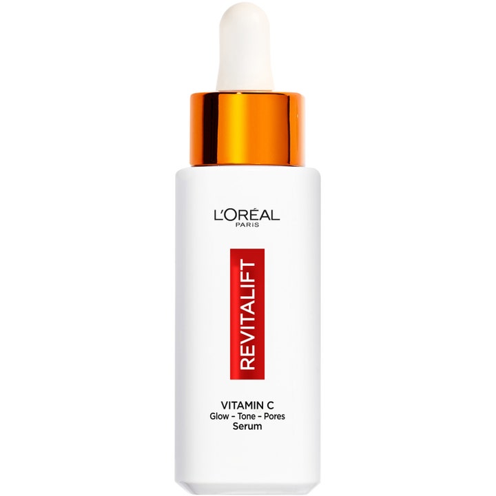 L'Oréal Paris Revitalift Vitamin C -seerumi heleyttää ihoa. Valkoinen pullo oranssilla metallisella korkilla.