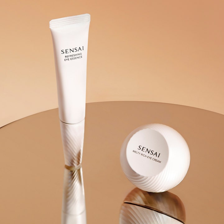 Sensai Refresh Eye Essence Refill 20 ml virkistävä silmänympäryshoito valkoisessa tuubissa ja pyöreässä purkissa
