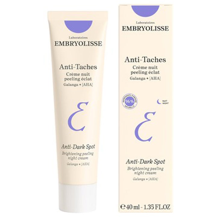 Embryolisse Anti-Dark Spot 40 ml kirkastava yövoide vaaleassa tuubissa ja pahvipakkauksessa liloilla yksityiskohdilla.