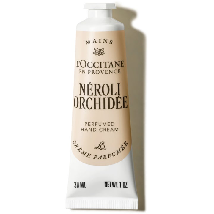 L'Occitane Néroli & Orchidée 30 ml ravitseva käsivoide tyylikkäässä vaaleanbeigessä ja valkoisessa tuubissa