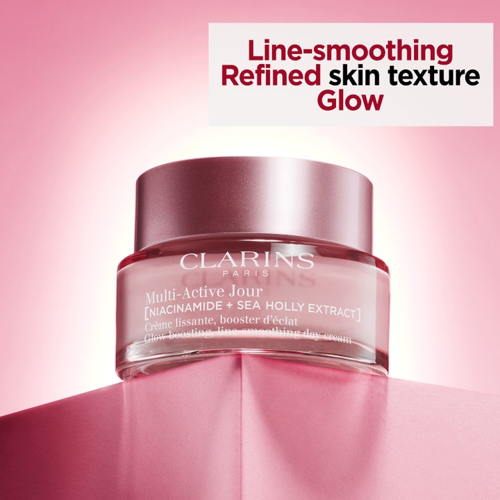 Clarins Multi-Active Jour 50 ml heleyttävä ja juonteita silottava päivävoide niasiiniamidilla vaaleanpunaisessa purkissa