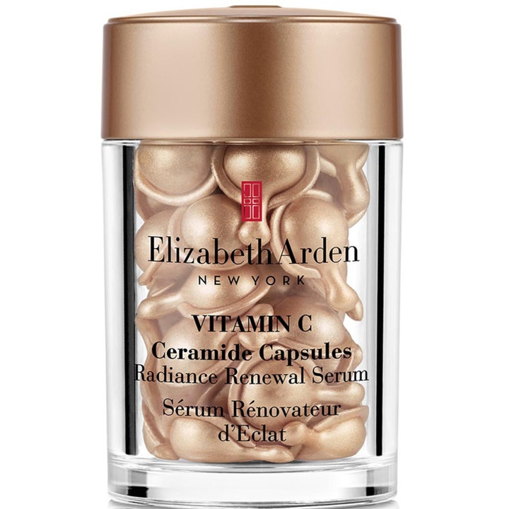 Elizabeth Arden Vitamin C Ceramide Capsules kirkastava seerumi kapseleina läpinäkyvässä purkissa kultaisella kannella.