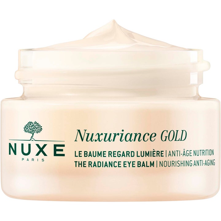 Nuxe Nuxuriance Gold The Radiance Eye Balm 15 ml ravitseva silmänympärysvoide ja sen täyteläinen vaalea voidekoostumus
