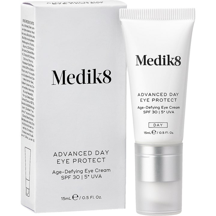 Medik8 Advanced Day Eye Protect 15 ml aurinkosuojavoide silmänympäryksille valkoisessa tuubissa ja pakkauksessa.