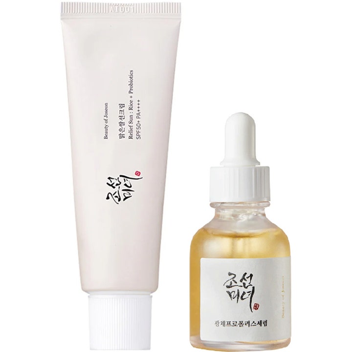 Beauty of Joseon Relief Sun ja Glow Serum setti heleyttää ihoa valkoisessa tuubissa ja keltaisessa lasipullossa.