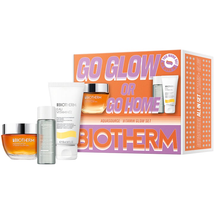Biotherm Aquasource + Vitamin Glow Set heleyttävä lahjasetti sisältää oranssin geelivoiteen ja tuubit värikkään rasian edessä.
