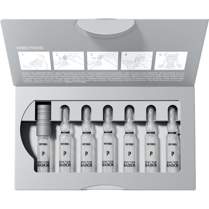 Babor DOC Rejuvenation 14 ml uudistava seerumi avatussa pakkauksessa, jossa on seitsemän ihoa silottavaa ampullia.