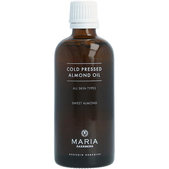 Maria Åkerberg Cold Pressed Almond Oil pehmentävä vartaloöljy ruskeassa lasipullossa valkoisella korkilla.