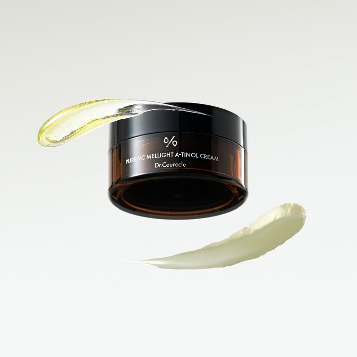 Dr. Ceuracle Pure VC Mellight A-tinol Cream 70 g kirkastava kasvovoide ruskeassa purkissa ja kaksi voidenäytettä.