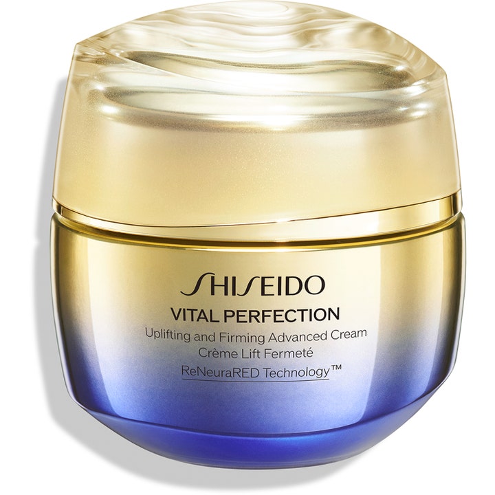 Shiseido Vital Perfection Uplifting and Firming Advanced Cream kiinteyttävä kasvovoide kultaisessa ja sinisessä lasipurkissa