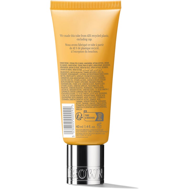 Molton Brown Flora Luminare 40 ml kosteuttava käsivoide keltaisen tuubin kääntöpuoli ja hopeinen korkki.