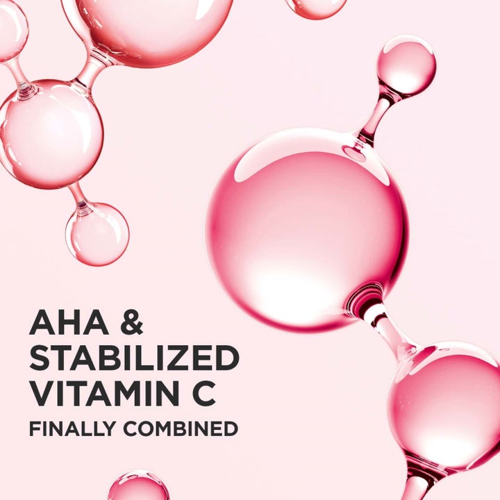 Clarins Multi-Active Glow Serum 30 ml heleyttävä seerumi, jossa vaaleanpunaisia AHA- ja C-vitamiinimolekyylejä.