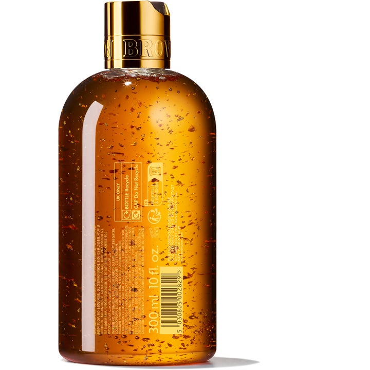 Molton Brown Mesmerising Oudh Accord & Gold 300 ml suihkugeeli on kultahippuja sisältävä ylellinen vartalonpesuaine.