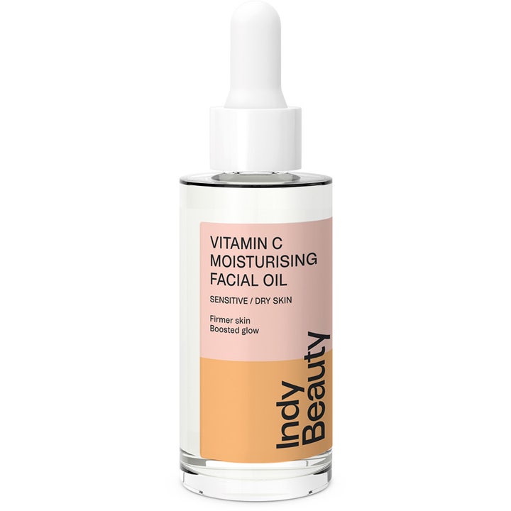Indy Beauty Vitamin C Moisturising Facial Oil heleyttävä kasvoöljy kirkkaassa lasipullossa valkoisella pipetillä
