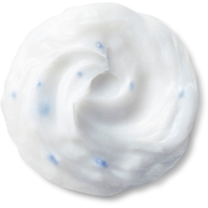 Shiseido Defend Deep Cleansing Foam 125 ml puhdistusvaahto, jonka kermainen koostumus sisältää sinisiä rakeita.