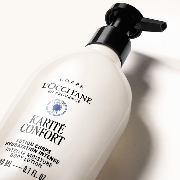 L'Occitane Shea Butter Body Lotion 240 ml kosteuttava vartalovoide valkoisessa pumppupullossa.