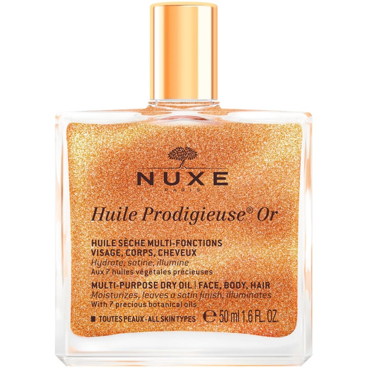 Nuxe Huile Prodigieuse Or 50 ml heleyttävä monitoimikuivaöljy kimaltelee kultaisena neliönmuotoisessa lasipullossa.