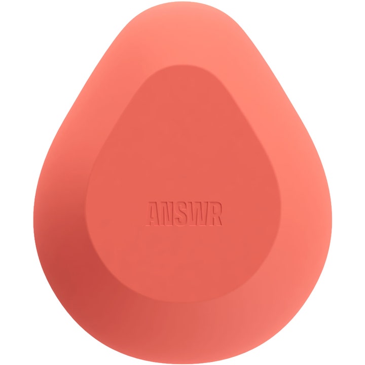 ANSWR Exfoliating Hair Removal Drop 1 kpl kuoriva karvanpoistoväline on persikanvärinen ja pisaran muotoinen työkalu.