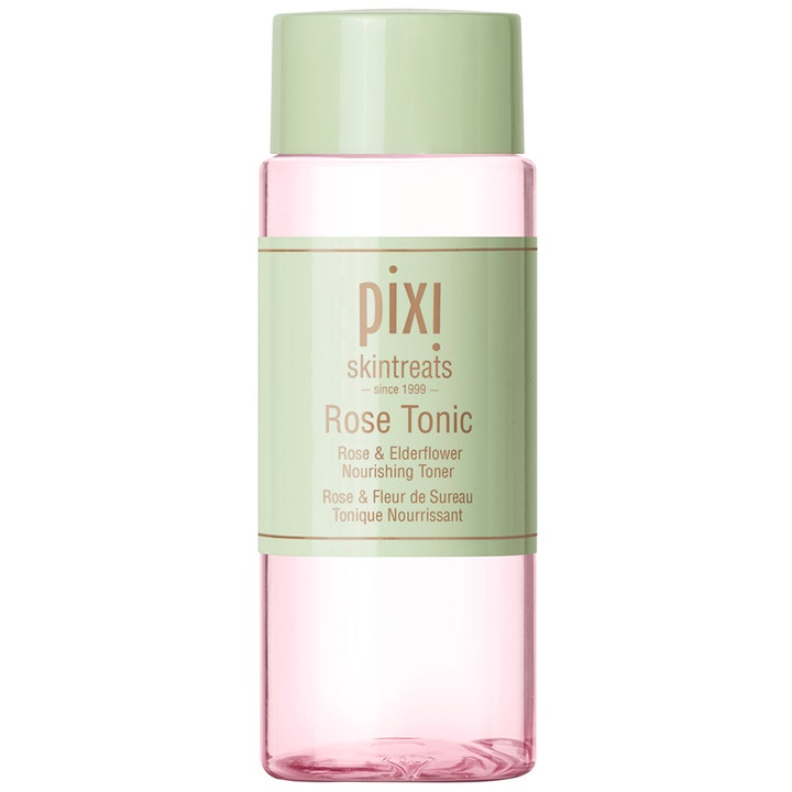 Pixi Rose Tonic hoitava kasvovesi ravitsee ihoa vaaleanpunaisella nesteellä kirkkaassa pullossa ja vihreällä korkilla