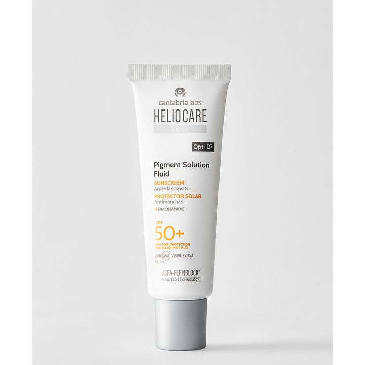 Heliocare Pigment Solution Fluid SPF 50+ 50 ml aurinkovoide pigmenttimuutoksia vastaan valkoisessa tuubissa.