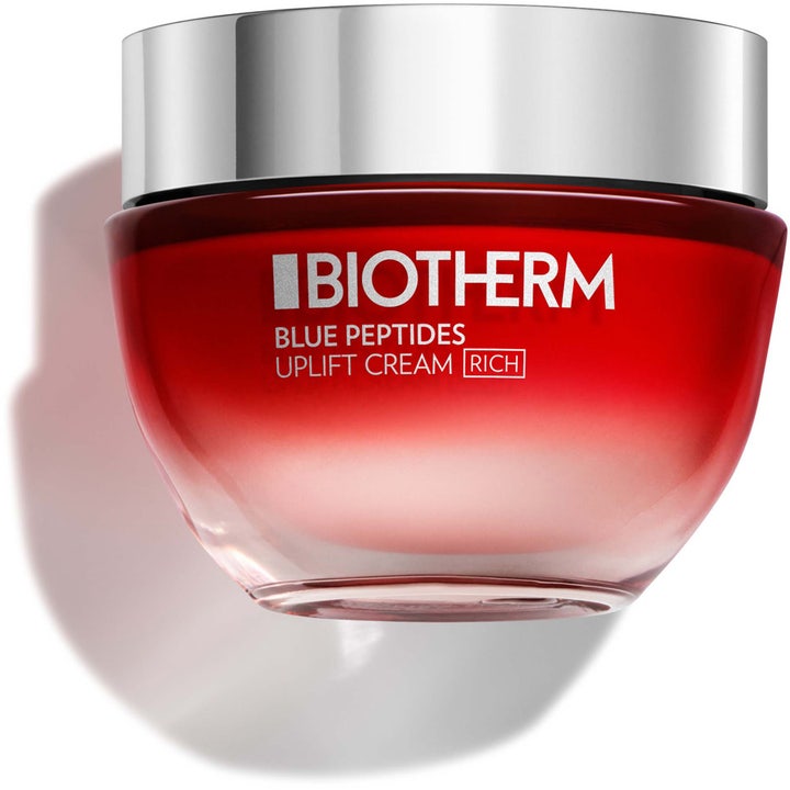 Biotherm Blue Peptides Uplift Cream Rich kiinteyttävä kasvovoide punaisessa liukuvärjätyssä lasipurkissa hopeisella kannella