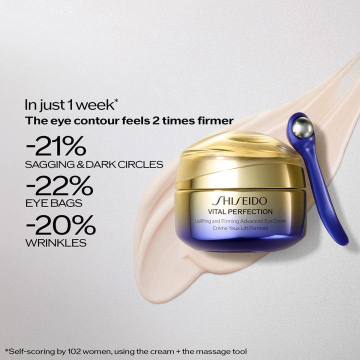 Shiseido Vital Perfection Eye Cream 15 ml kiinteyttävä silmänympärysvoide kultaisessa purkissa sinisen hierontatyökalun kera
