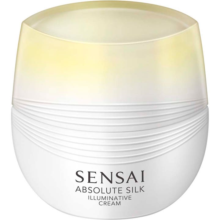 Sensai Absolute Silk Illuminative Cream 40 ml heleyttävä kasvovoide valkoisessa uurretussa purkissa keltaisella kannella