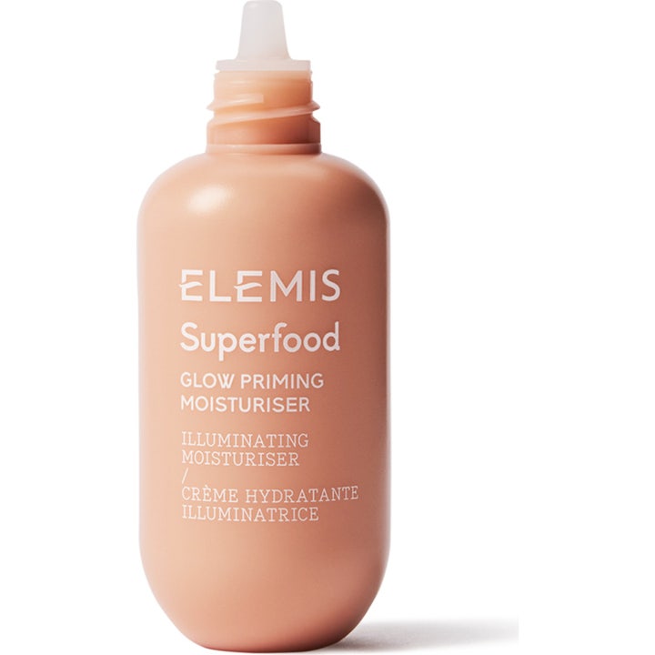 Elemis Superfood Glow Priming Moisturiser kirkastava kosteusvoide persikanvärisessä muovipullossa kapealla kärjellä.