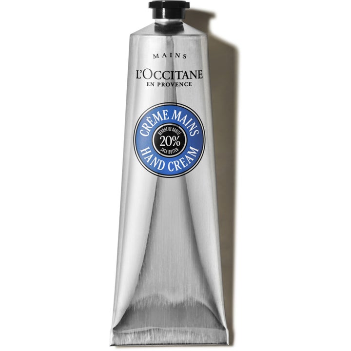 L'Occitane Shea Hand Cream 150 ml ravitseva käsivoide hopeisessa tuubissa sinisellä etiketillä.