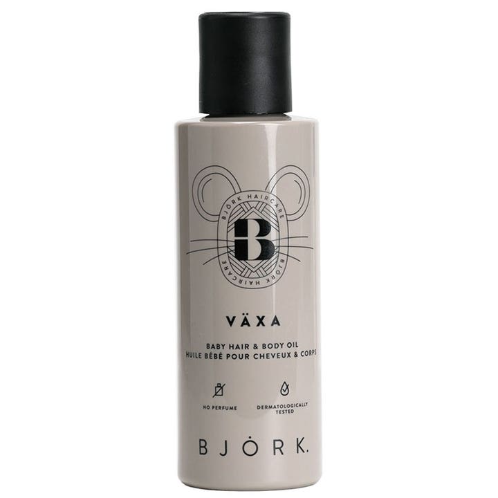Björk Växa Baby Hair & Body Oil hoitava vauvaöljy harmaassa muovipullossa jossa on musta korkki ja hiirihahmo