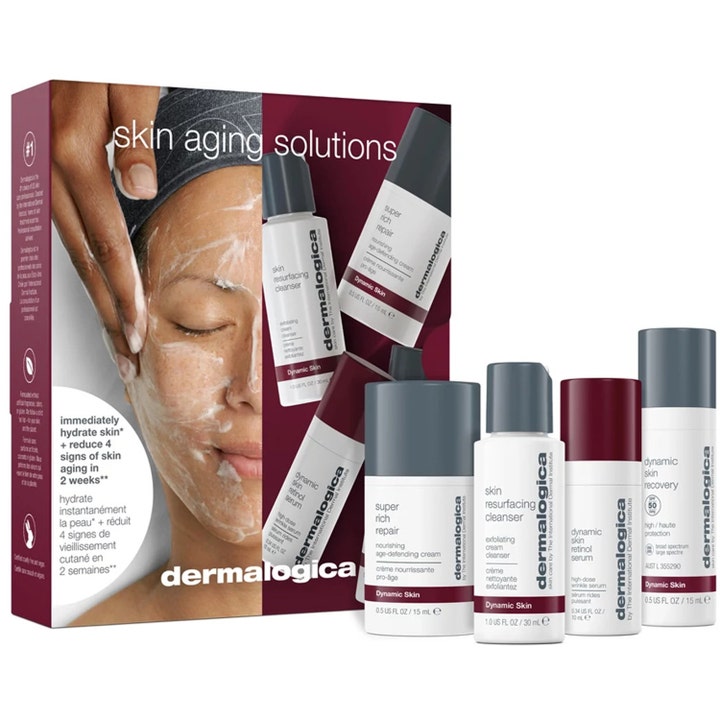 Dermalogica Skin Aging Solutions 4 tuotteen ihonhoitosetti silottaa ihoa neljällä pienellä valkoisella ja harmaalla pullolla.