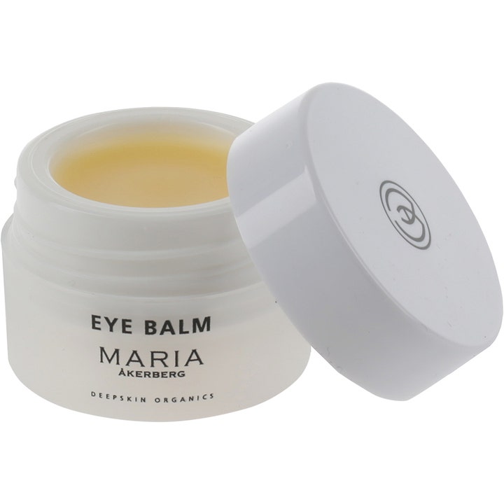 Maria Åkerberg Eye Balm 10 ml kosteuttava silmänympärysvoide avatussa valkoisessa purkissa jossa näkyy keltainen palsami