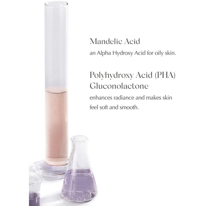 Exuviance Night Corrector 50 g yövoide heleyttää ihoa mantelihapolla ja PHA-hapolla laboratoriolaseissa.