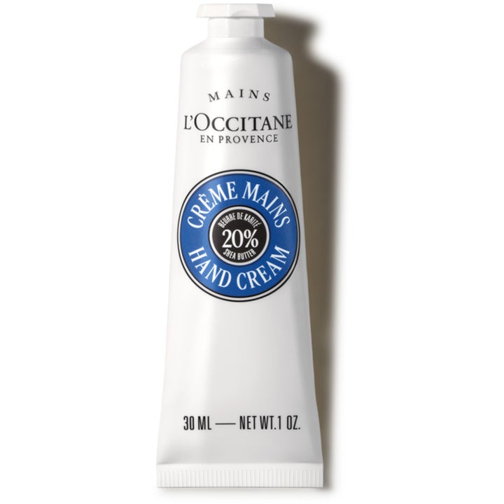 L'Occitane Shea Butter Hand Cream 30 ml kosteuttava käsivoide valkoisessa puristettavassa tuubissa sinisellä logolla