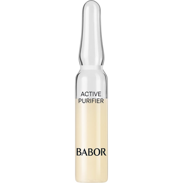 Babor Active Purifier 2 ml puhdistava seerumi kirkkaassa lasiampullissa, joka sisältää vaaleankeltaista nestettä.
