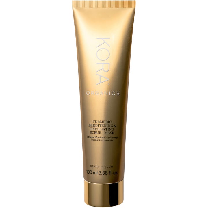 Kora Organics Turmeric Brightening & Exfoliating Scrub + Mask 100 ml on kirkastava kasvonaamio ja kuorinta kultaisessa tuubissa.