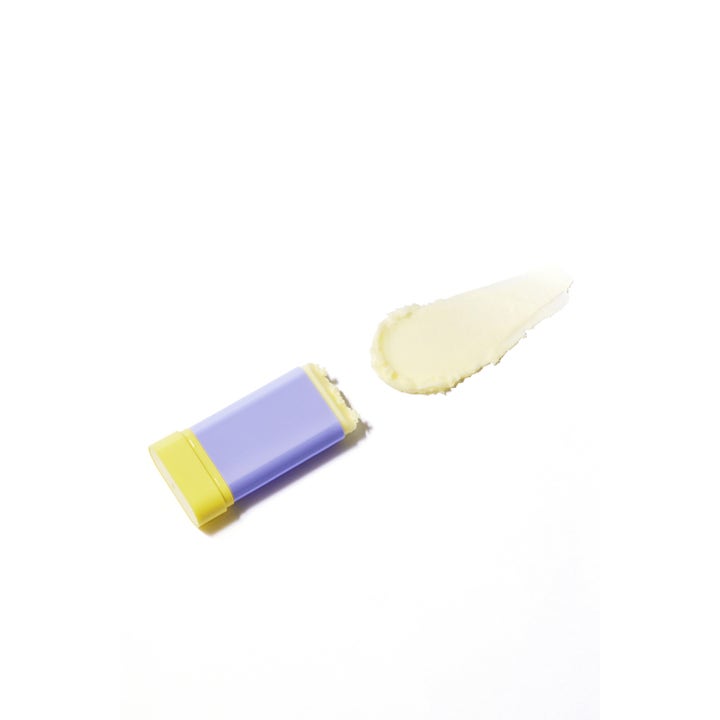 By Wishtrend Pore Smoothing Bakuchiol Sun Stick 18 g aurinkovoidepuikko ja vaalea voidemainen koostumus.