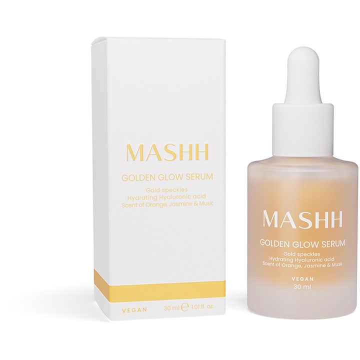 MASHH Golden Glow Serum 30 ml heleyttävä vegaaninen seerumi valkoisessa pakkauksessa ja huurteisessa lasipullossa.