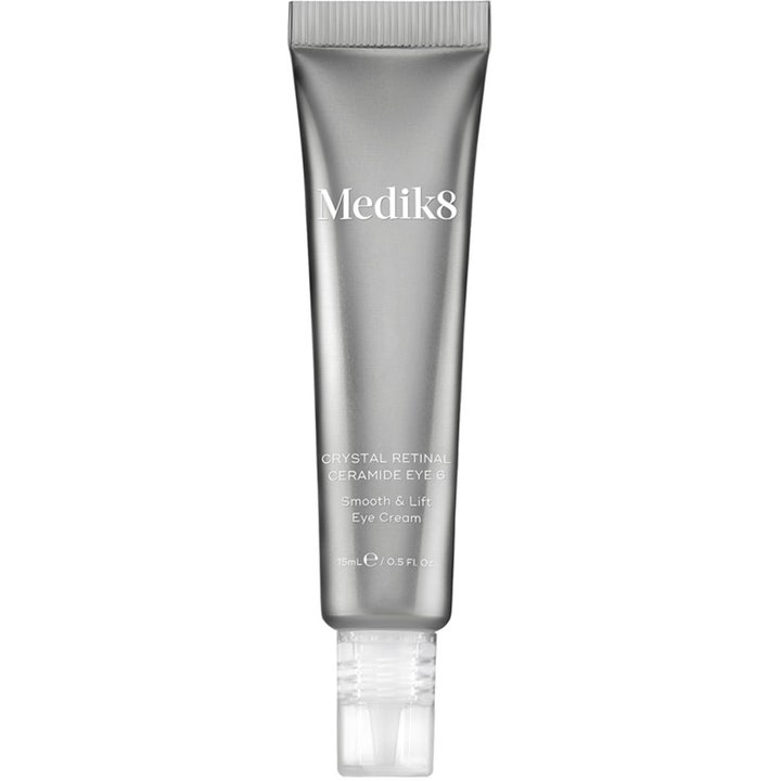 Medik8 Crystal Retinal Ceramide Eye 6 15 ml silottava silmänympärysvoide harmaassa metallinhohtoisessa tuubissa.