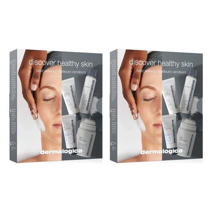 Dermalogica Discover Healthy Skin Kit 4 kpl kirkastava ihonhoitosetti harmaassa pakkauksessa, jossa on nainen.