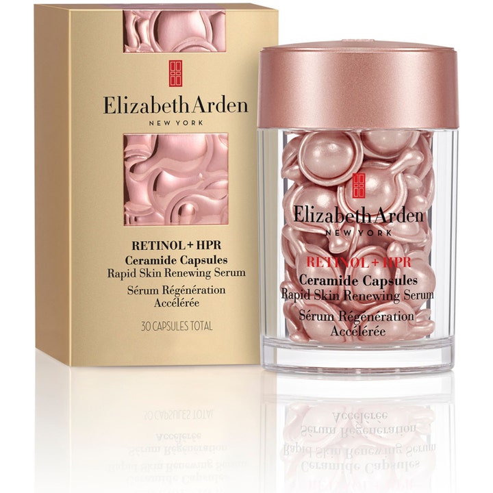 Elizabeth Arden Ceramide Capsules Retinol + HPR Serum 30 kpl ihoa uudistava seerumi kultaisessa rasiassa ja kapseleina.
