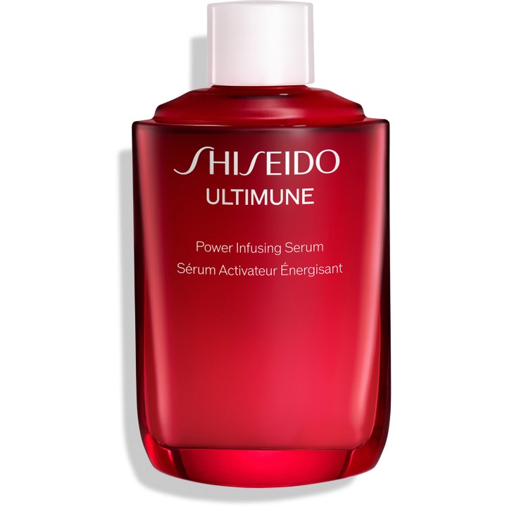 Shiseido Ultimune Power Infusing Serum vahvistava ja heleyttävä kasvoseerumi punaisessa lasipullossa valkoisella korkilla.