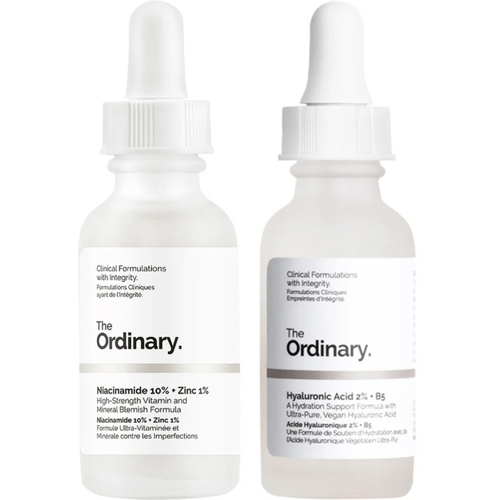 The Ordinary Niacinamide ja Hyaluronic Acid 30 ml kirkastavat ja kosteuttavat seerumit valkoisissa pipettipulloissa.
