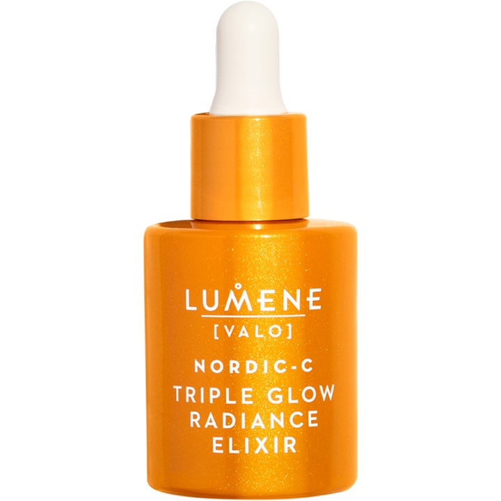 Lumene Nordic-C Triple Glow Radiance Elixir hehkua antava seerumi kimaltelevassa oranssissa lasipullossa.
