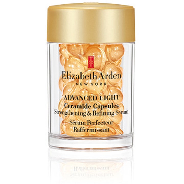 Elizabeth Arden Advanced Light Ceramide Capsules ihoa vahvistava seerumi kultaisina kapseleina kirkkaassa kultakantisessa purkissa