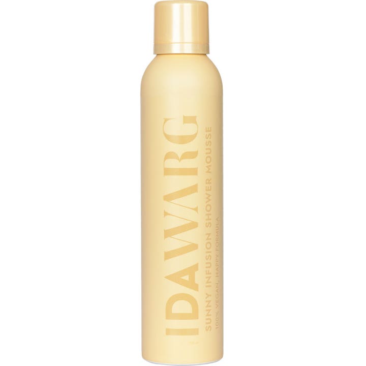 Ida Warg Sunny Infusion Shower Mousse 200 ml kosteuttava suihkumousse tyylikkäässä vaaleankeltaisessa pullossa