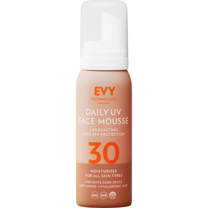 EVY Technology Daily UV Face Mousse SPF 30 kosteuttava aurinkovoide persikanvärisessä pullossa valkoisella korkilla.