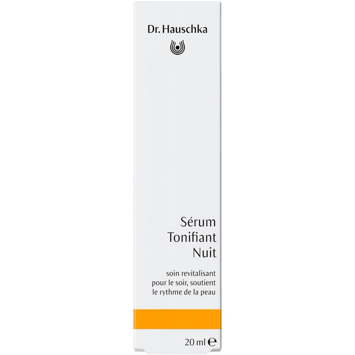 Dr. Hauschka Night Serum 20 ml elvyttävä kasvoseerumi valkoisessa pahvipakkauksessa oranssilla raidalla